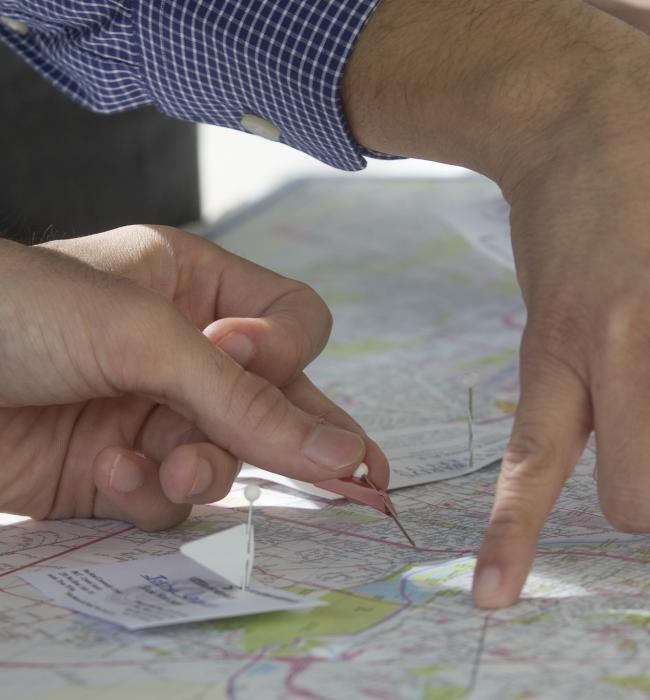 People analyzing a map