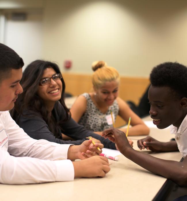 Students talking in a classroom